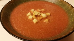 tomato anise soup blended with cream in bowl